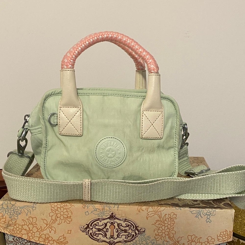 Kipling Mint Green Handbag with Pink Accents, nice condition.